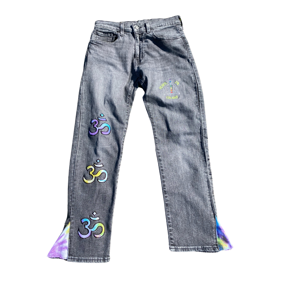 Black Unapologetic Youth Peace Of Mind jeans shown on a model, featuring a classic denim fit with minimal distressing.