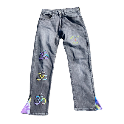 Black Unapologetic Youth Peace Of Mind jeans shown on a model, featuring a classic denim fit with minimal distressing.