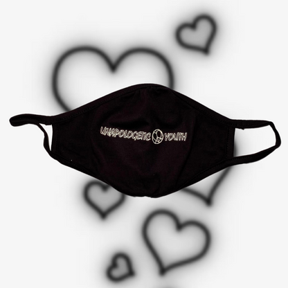 Unapologetic Youth Corona Killers facemask featuring bold black and white design with protective fabric and adjustable ear loops.