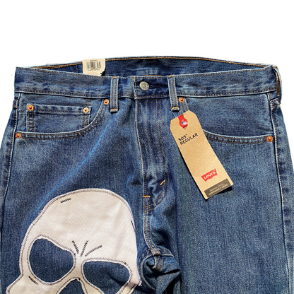 Unapologetic Youth x Levi blue denim jeans from "To The Bone" collection, showing classic fit and detailed stitching.